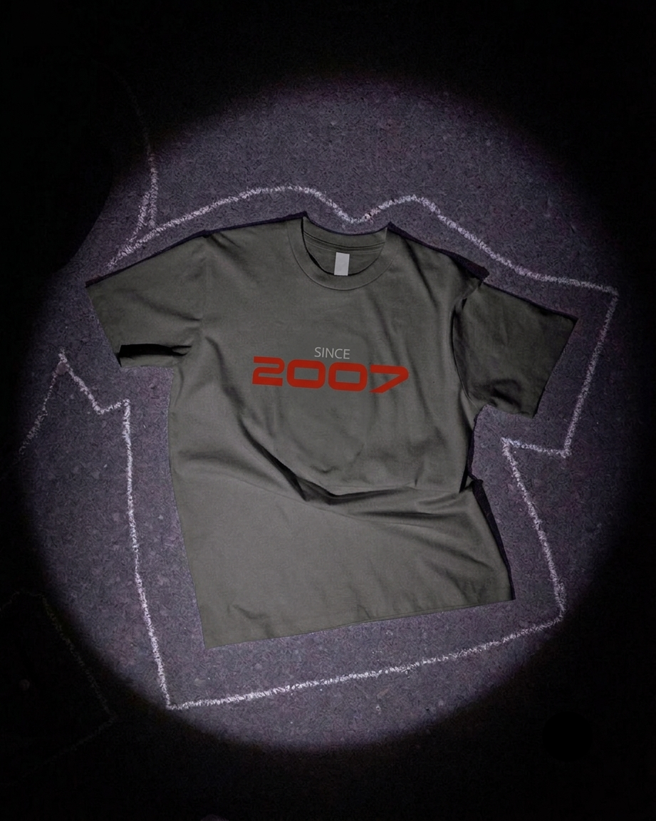 Green t-shirt with 'Since 2007' text on a dark background